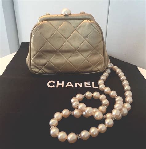 coco chanel purse gold chain|pictures of old chanel purses.